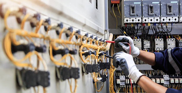 Professional Electrical Panel Upgrade technician working in Chickasaw County County, IA